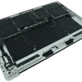 Top Case with Battery and Keyboard (ANSI US) For MacBook Pro 15" A1990 (2018-2019) (Used OEM Pull: Grade B/C) (Silver)